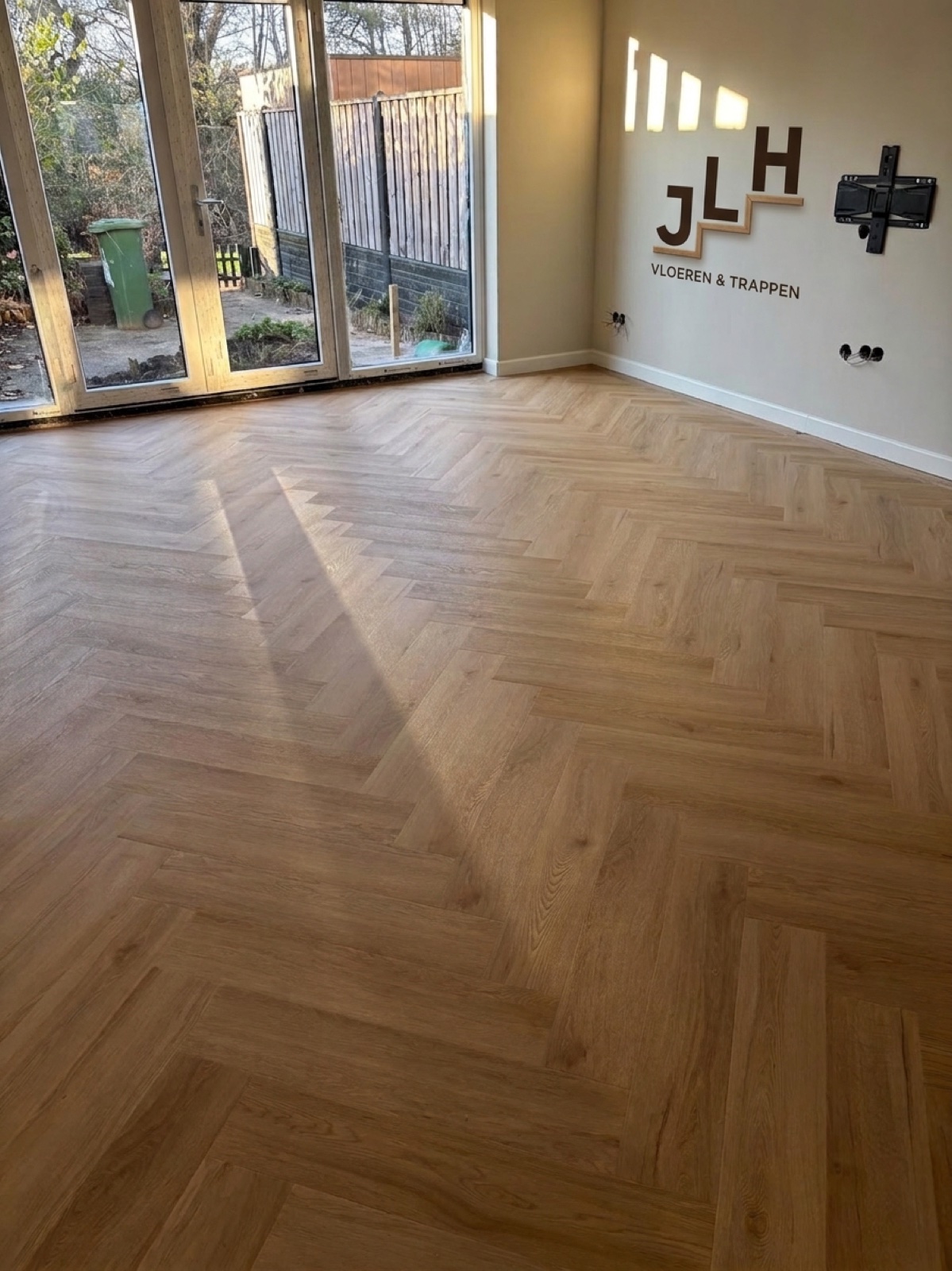 JLH project — logo on wall